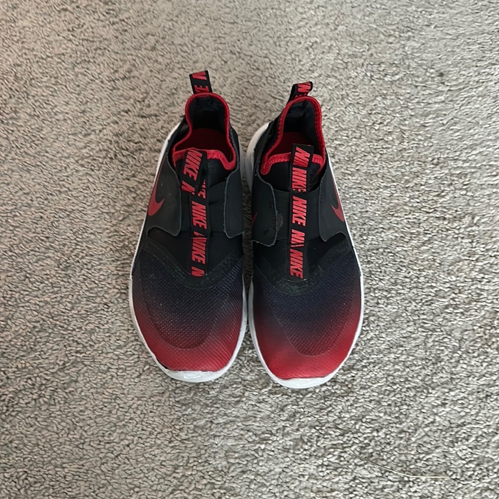 Kids Nike, tennis shoes in a size 4